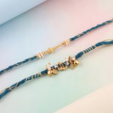 Hanuman Braided Charm Bhaiya Bhabhi Rakhi Set | Need Asthetic background in pastel range , only highlight both producut in pastel background , highly enaging and convertible i need this all three attached ima