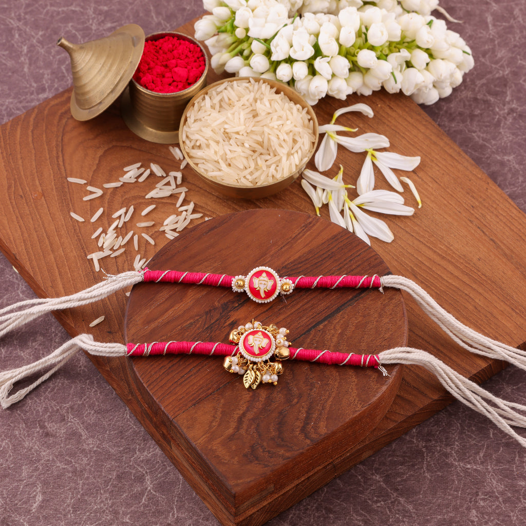 Pink Ganpati Charm Bhaiya Bhabhi Rakhi Set - Pink