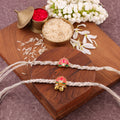 White Shubh Kamal Bhaiya Bhabhi Rakhi Set - White