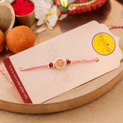 Thumbnail for Sacred Om Centerpiece Pearl Rakhi zoom