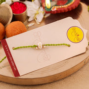 Thumbnail for Traditional Pearl Moti Rakhi Green Resham zoom