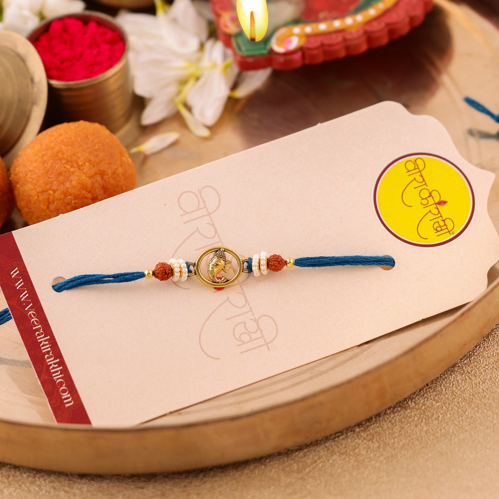 Ganesha Centerpiece Traditional Orange Beaded Rakhi zoom