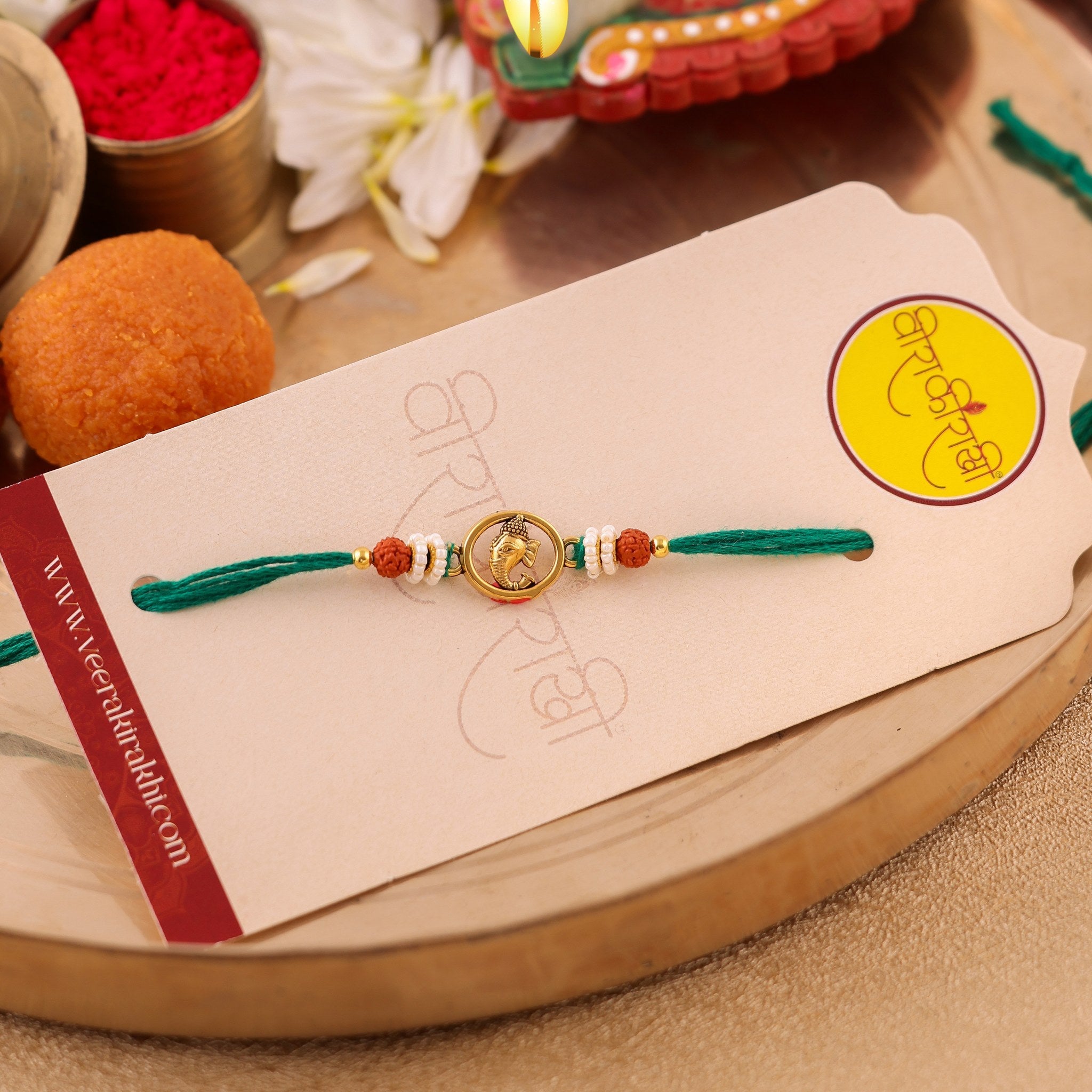 Ganesha Centerpiece Traditional Orange Beaded Rakhi zoom