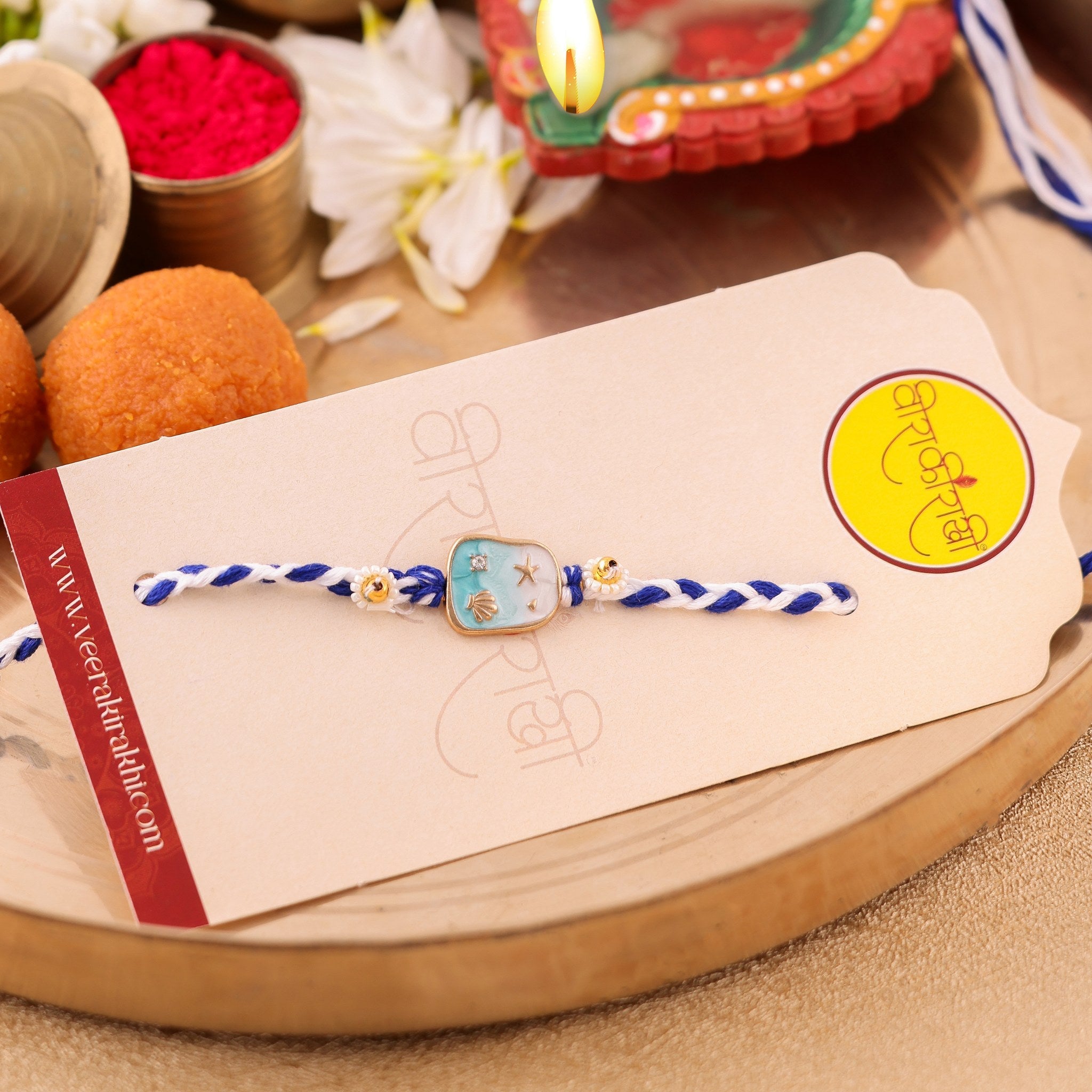 Blue Designer Charm Bhai Rakhi zoom