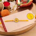 Yellow Evil Eye Bhai Rakhi zoom