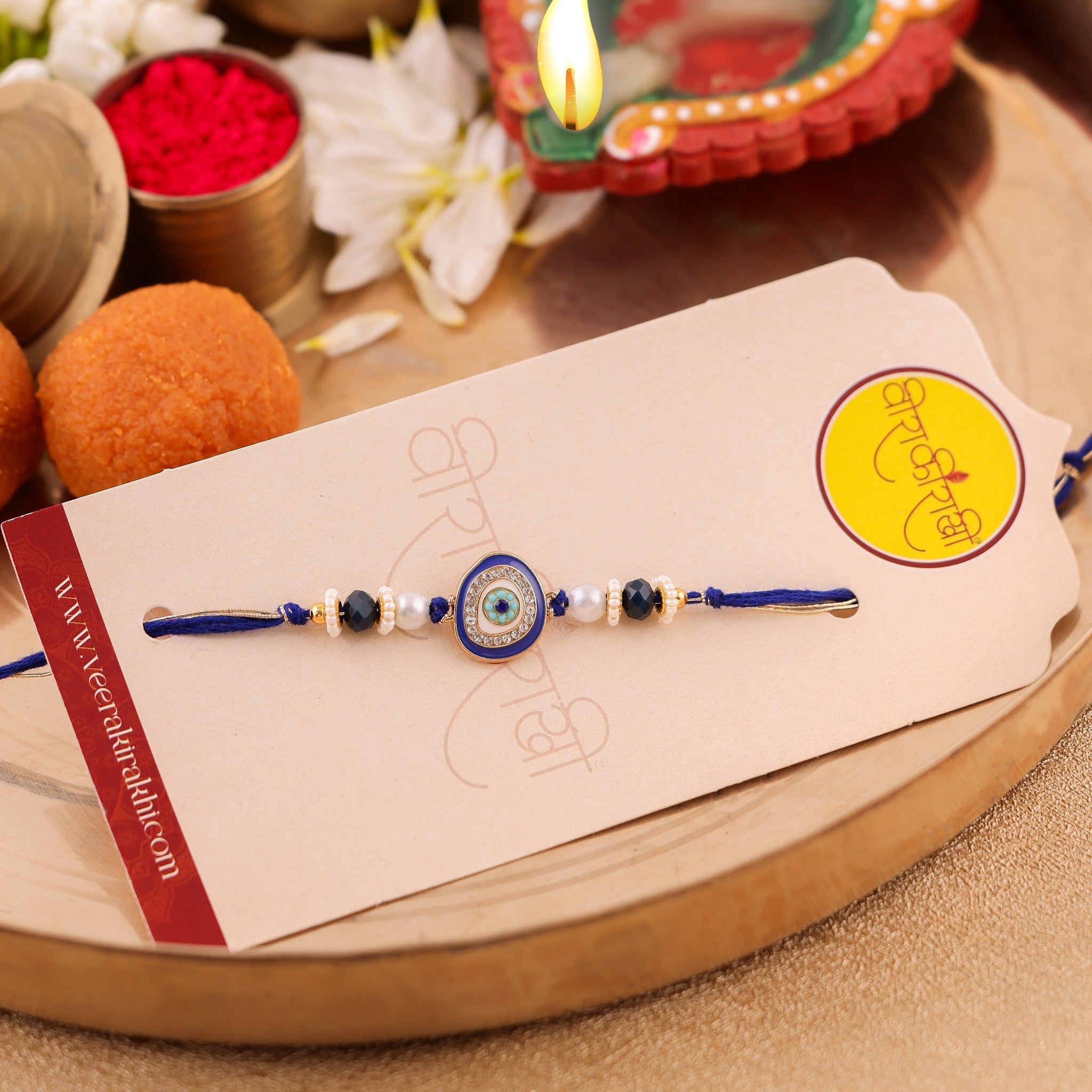 Blue Beaded Evil Eye Charm Bhai Rakhi zoom
