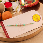Thumbnail for Vibrant Resham Thread Rakhi with Beadwork zoom
