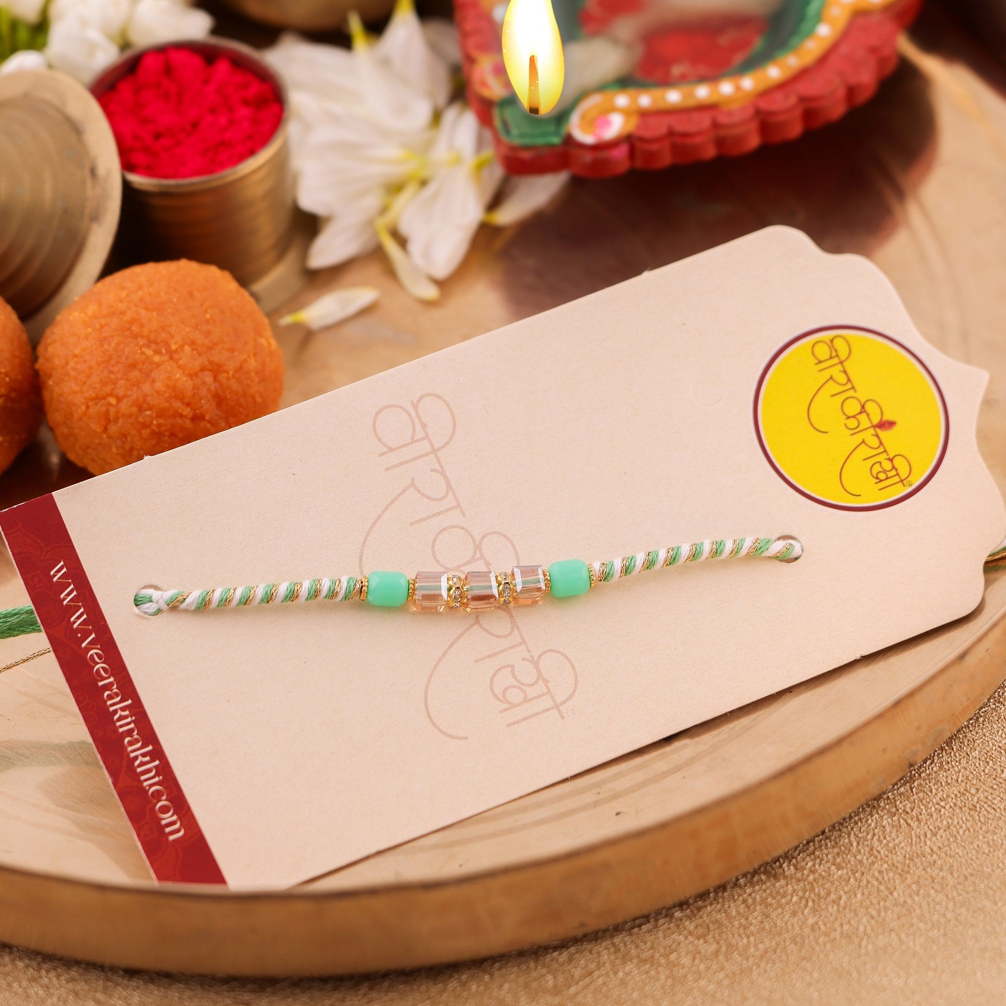 Vibrant Resham Thread Rakhi with Beadwork zoom
