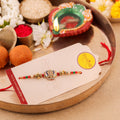 Ganesha Peacock Rakhi with Red Green Beads | Raksha Bandhan