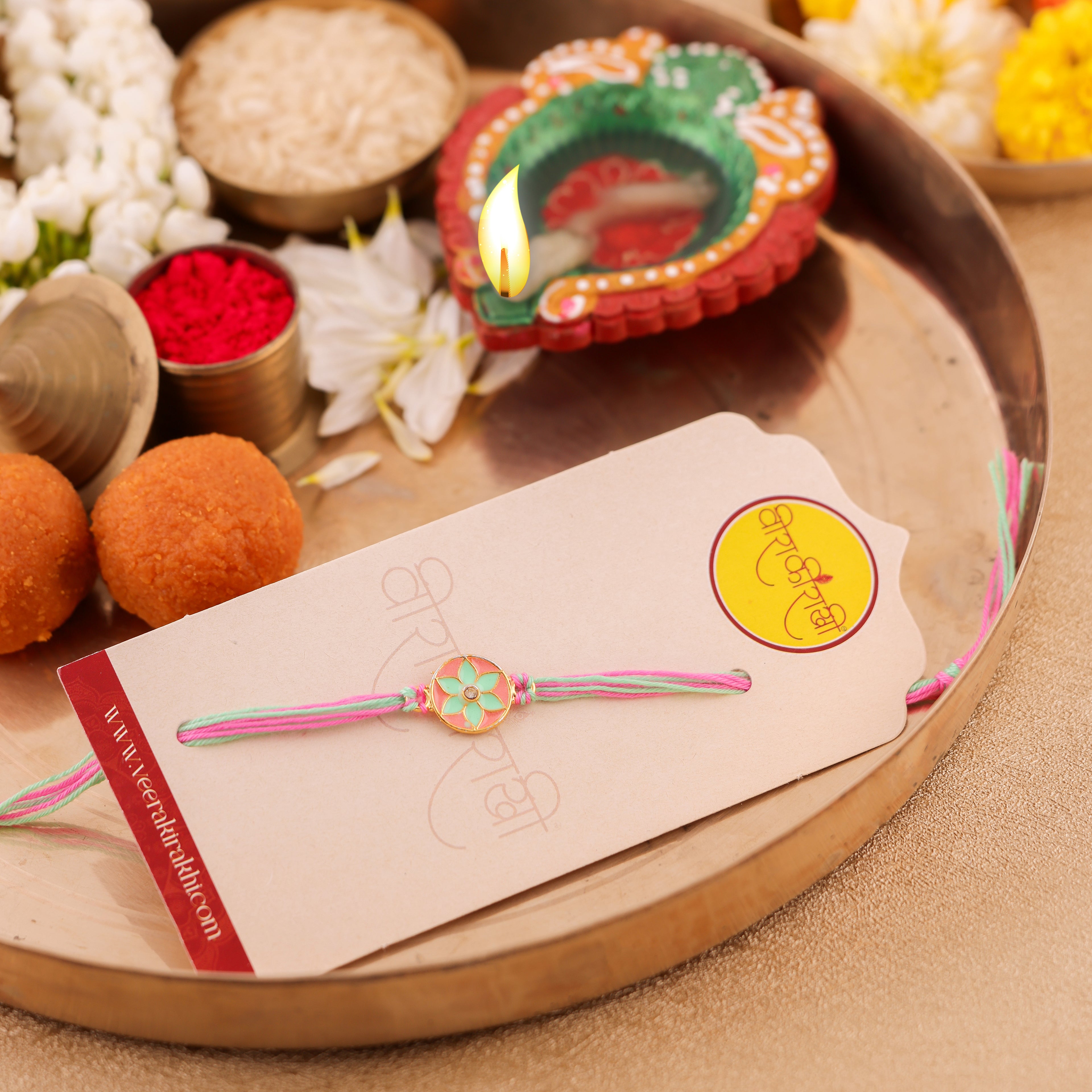 Purple Dharmachakra Charm Rakhi - Pink