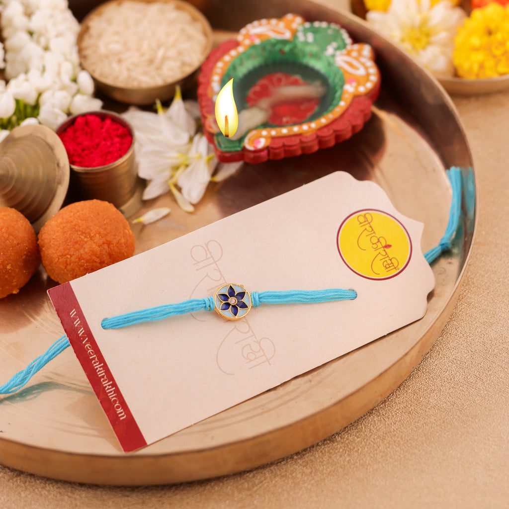 Purple Dharmachakra Charm Rakhi - SkyBlue