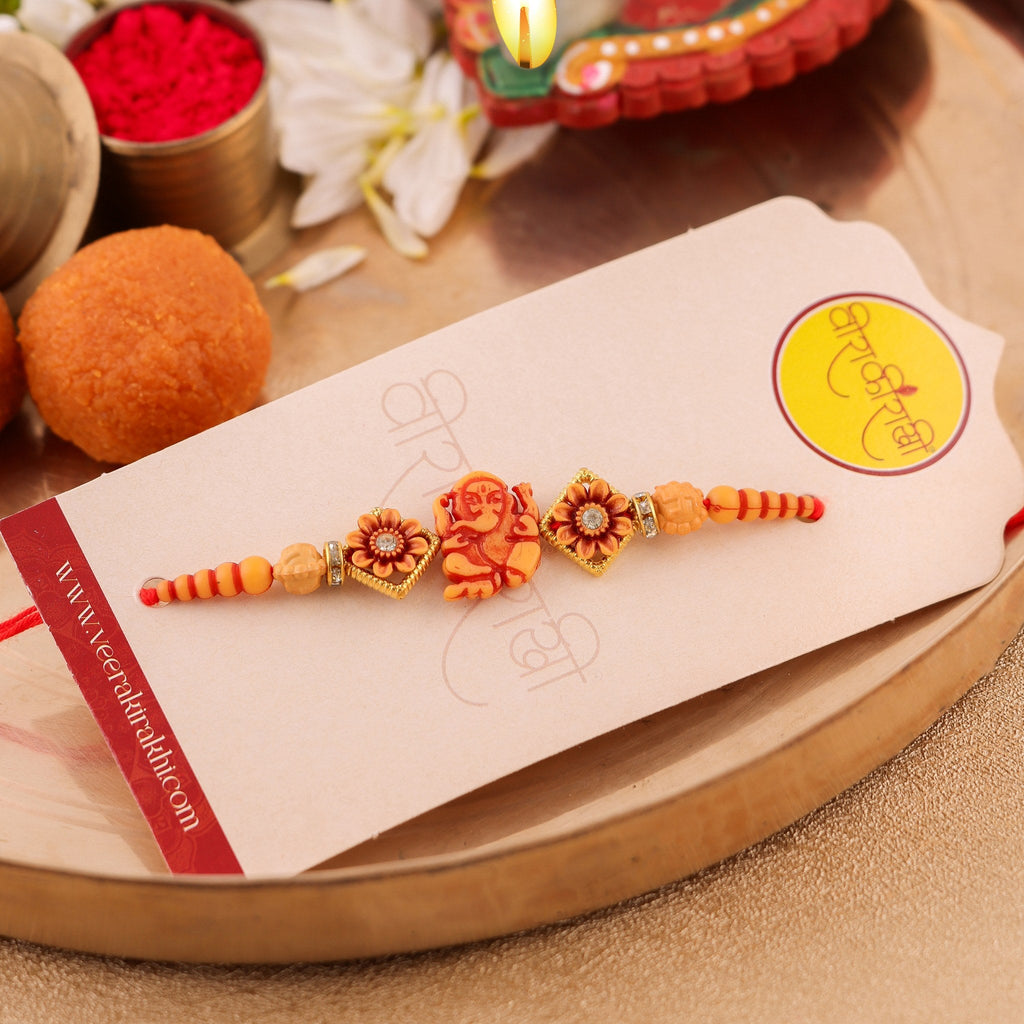 Handcrafted Orange Floral Meenakari Rakhi zoom