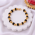 Black Bead and Gold Rudraksha Bracelet Rakhi zoom