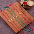 Delicate Kundan Floral Bhai Bhabhi Couple Rakhi Set