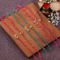 Kundan Floral Twist Bhai Bhabhi Couple Rakhi Set