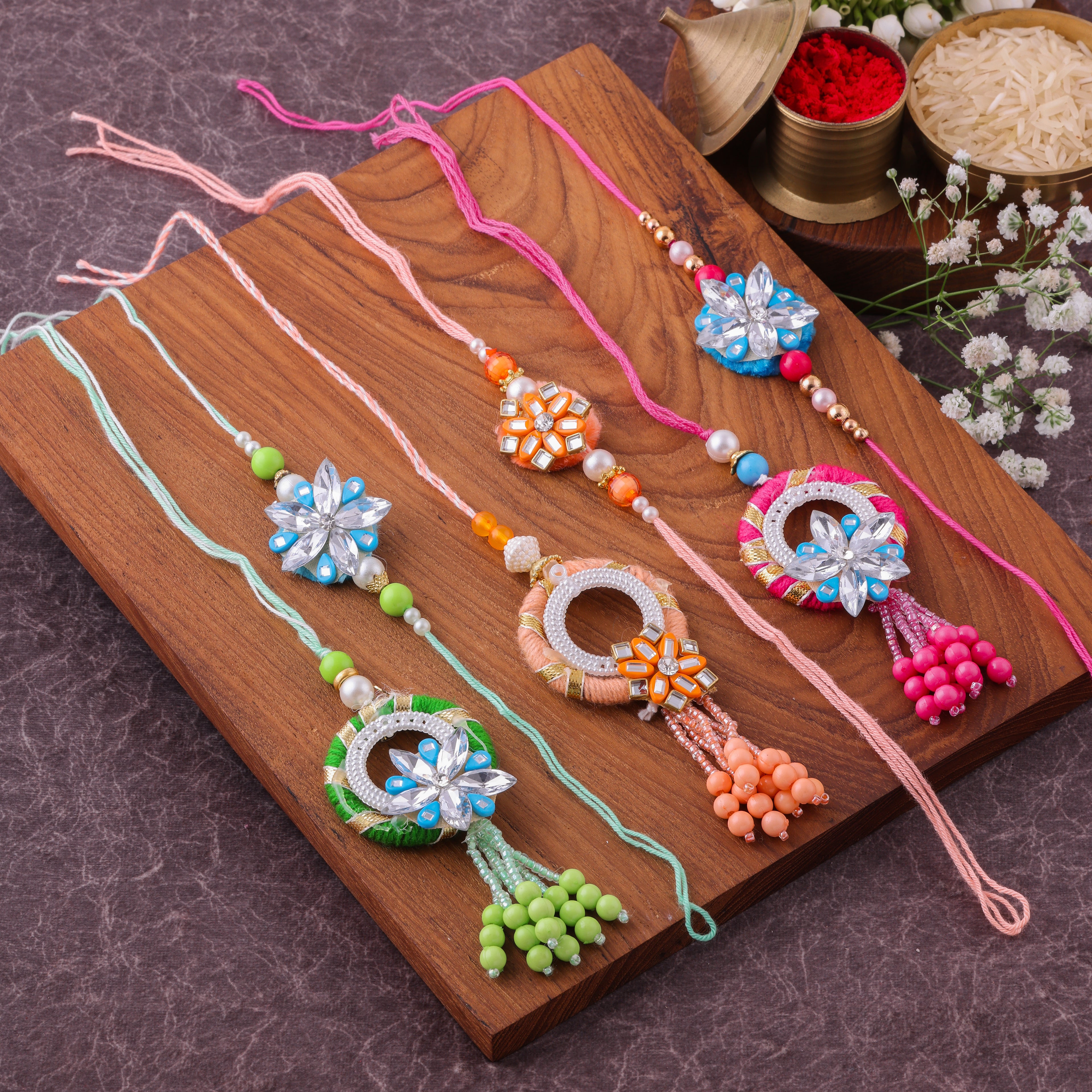 Pastel Floral Pom Pom Bhai Bhabhi Couple Rakhi Set