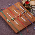 Meenakari Pearl Strand Bhai Bhabhi Couple Rakhi Set